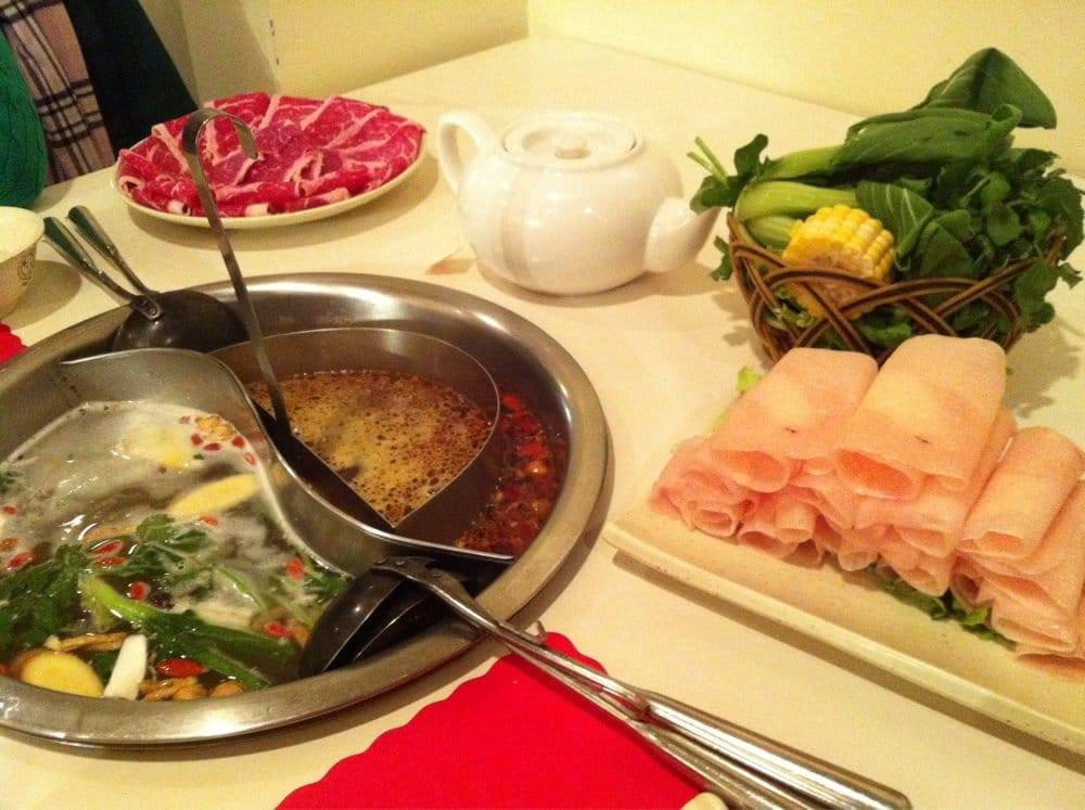 The Little Q Hot Pot invites guests to embark on a flavorful journey, where they can savor the taste of authentic Chinese hot pot cuisine.