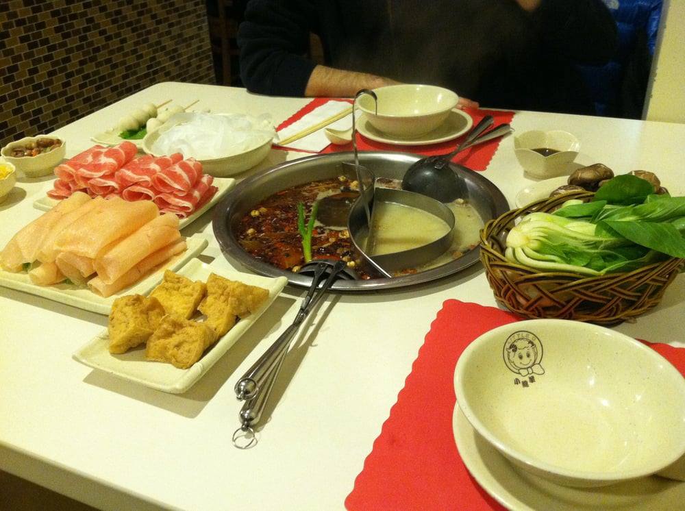 The Little Q Hot Pot invites guests to embark on a flavorful journey, where they can savor the taste of authentic Chinese hot pot cuisine.